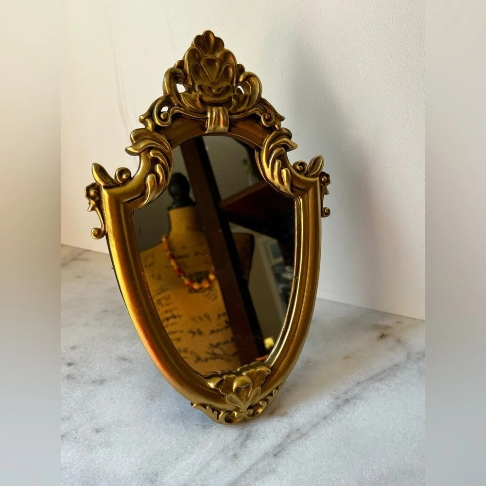 Ornate Gold and Black Decorative Mirror